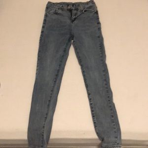 Girls light blue skinny jeans size M